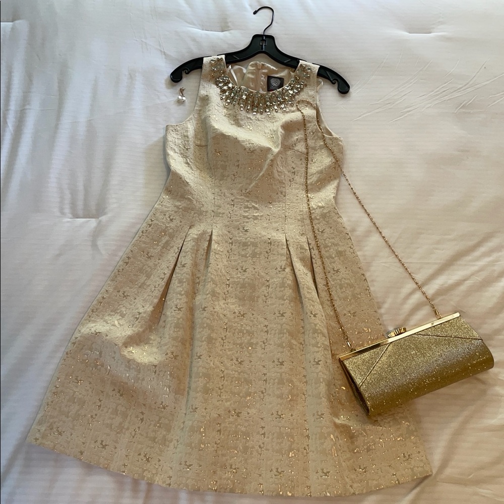 Cream & Gold colored dress by Vince Camuto Size 6 with a bedazzled neckline